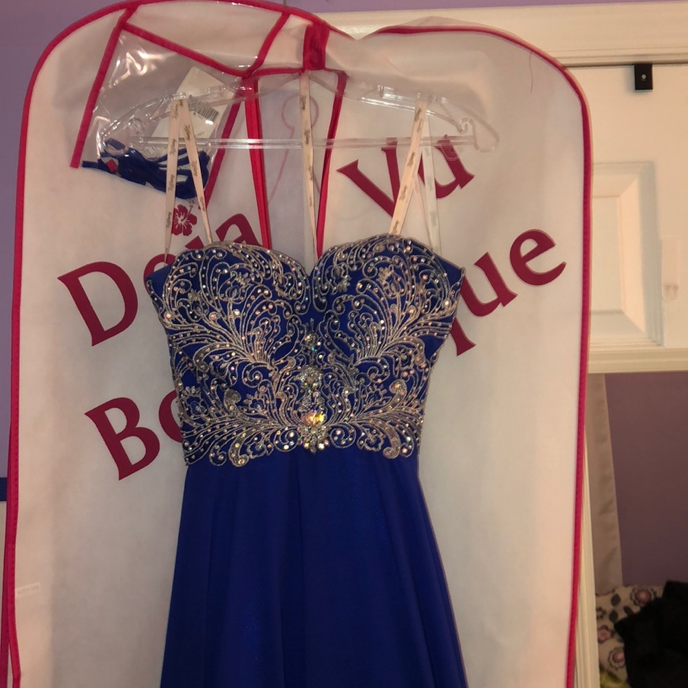Strapless Royal Blue Beaded Prom Dress.